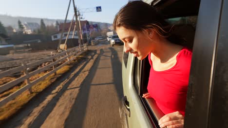 woman enjoying scenic drive