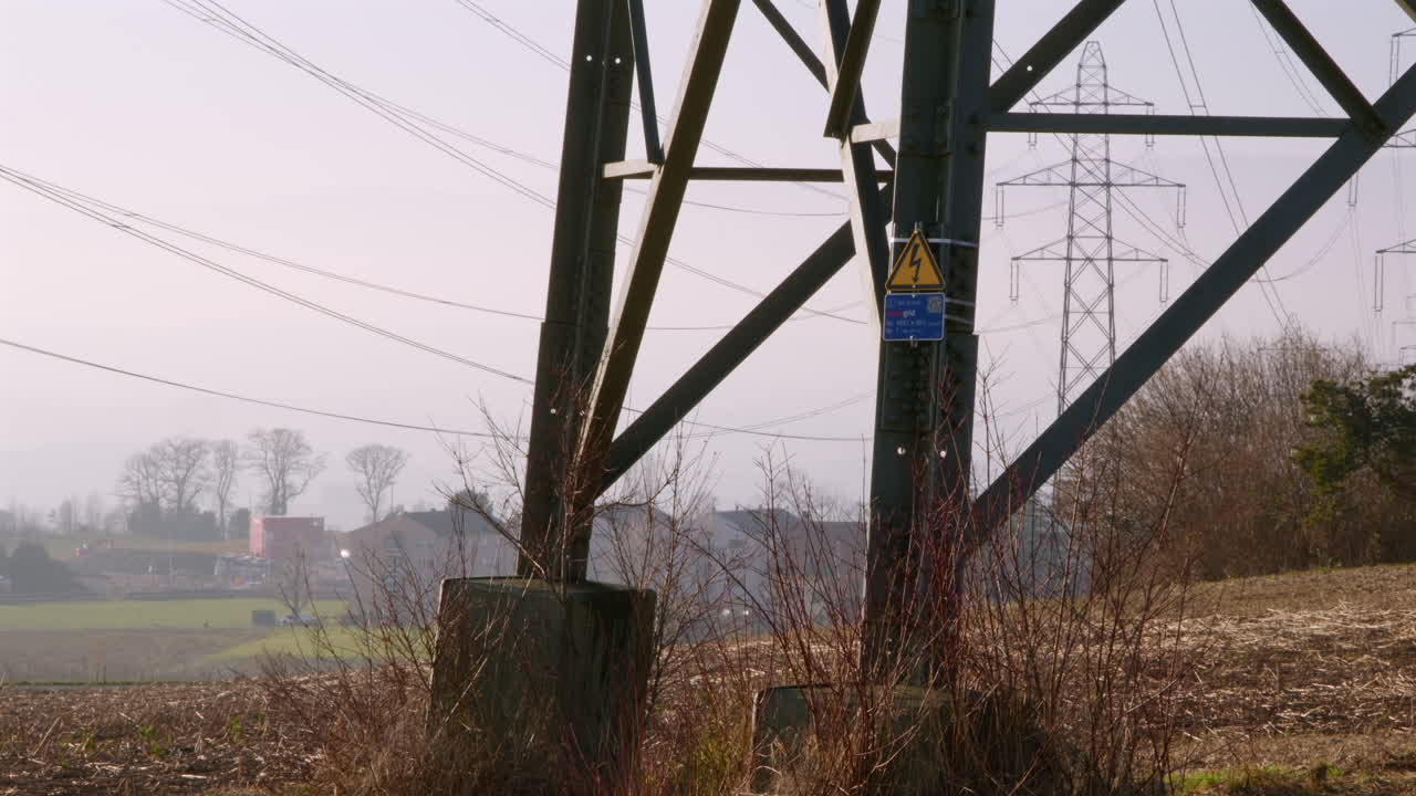 Caution warning message on foundation of high powered electricity in France outskirts