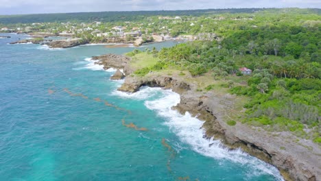 sea waves break on rocky coast of boca de yuma in dominican republic