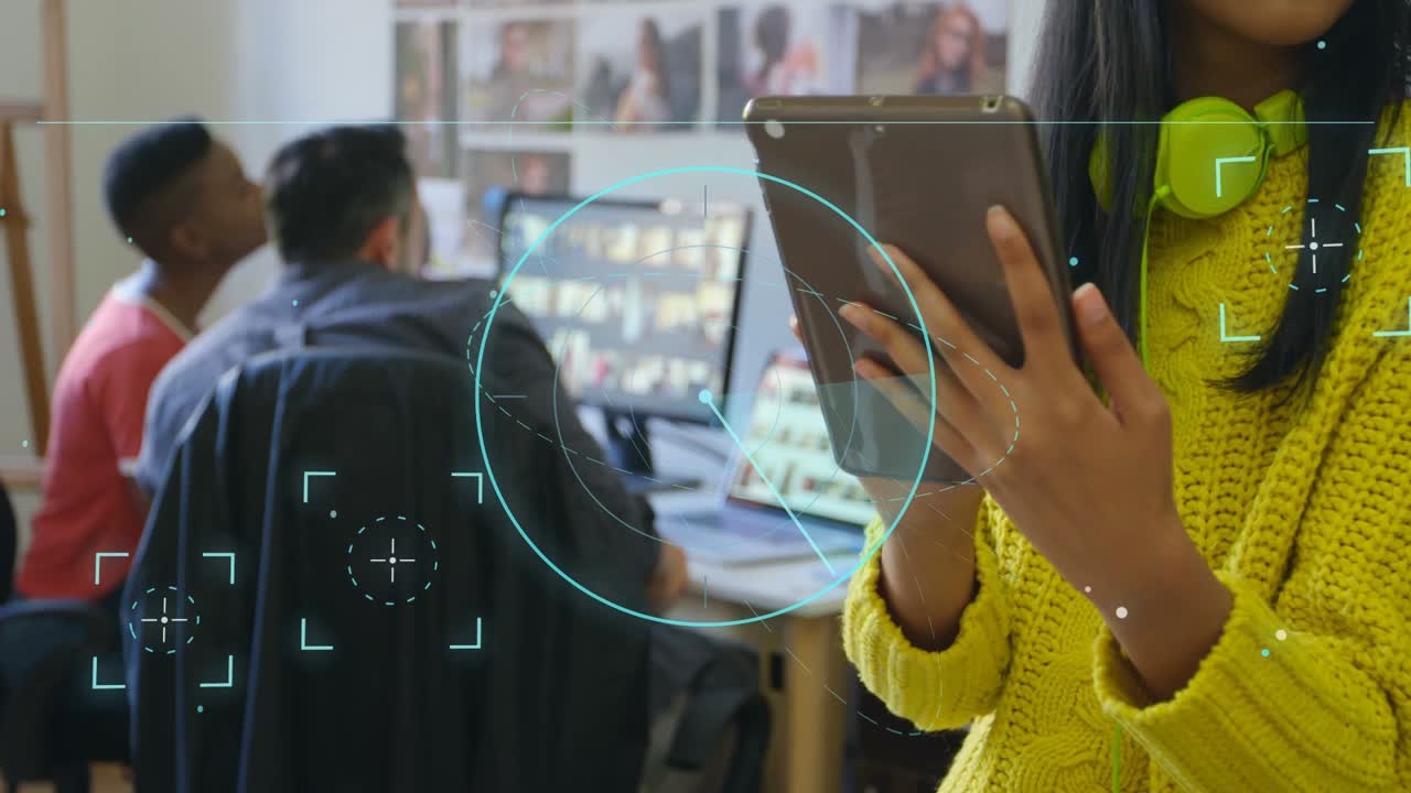 Woman standing right holding tablet and tapping, tablet tap initiating HUD sweep for editing review