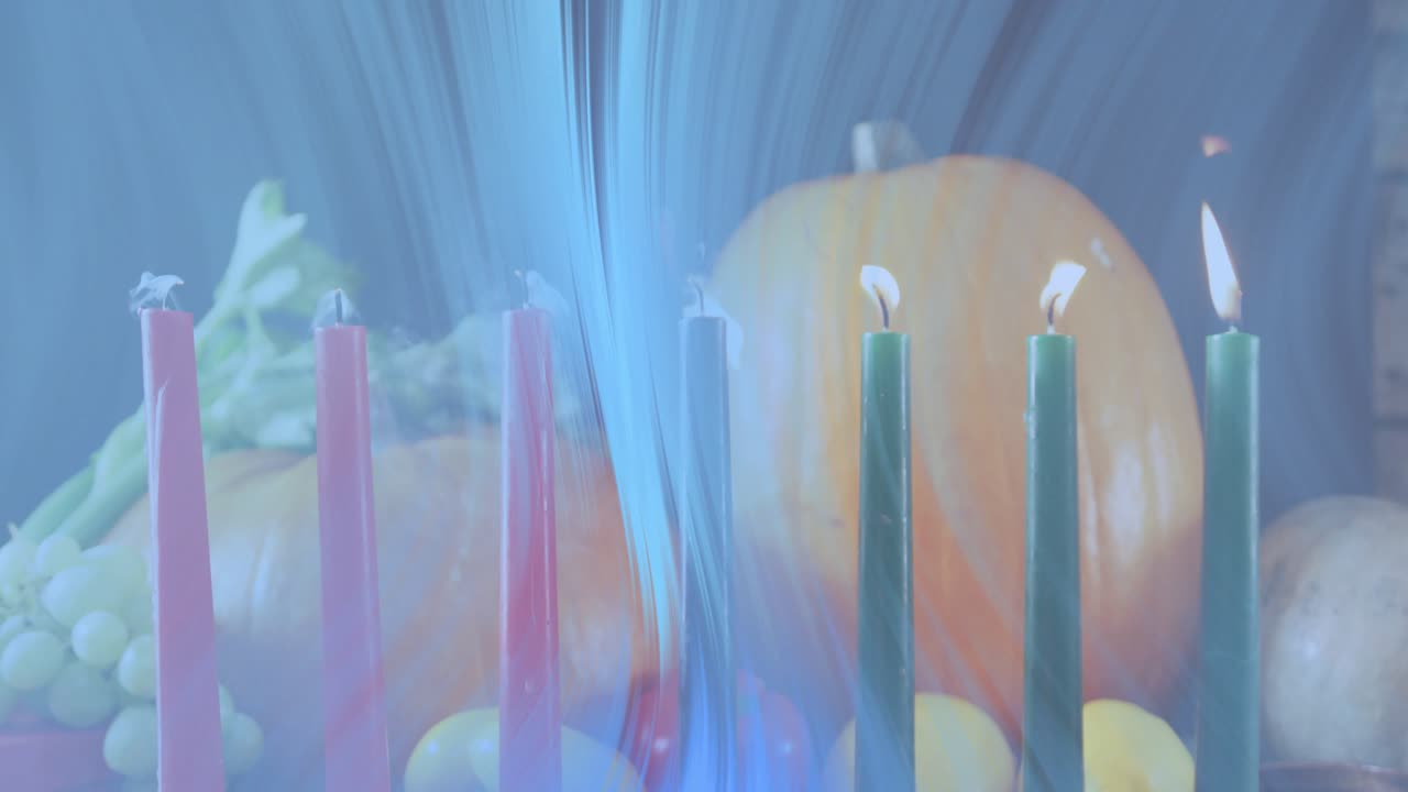 Blue light sweeping seven candles extinguishing flames and revealing smoke drifting above produce