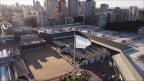 Argentinian-Flag-Waving-In-Buenos-Aires-La-Rural-Urban-Park,-Slomo