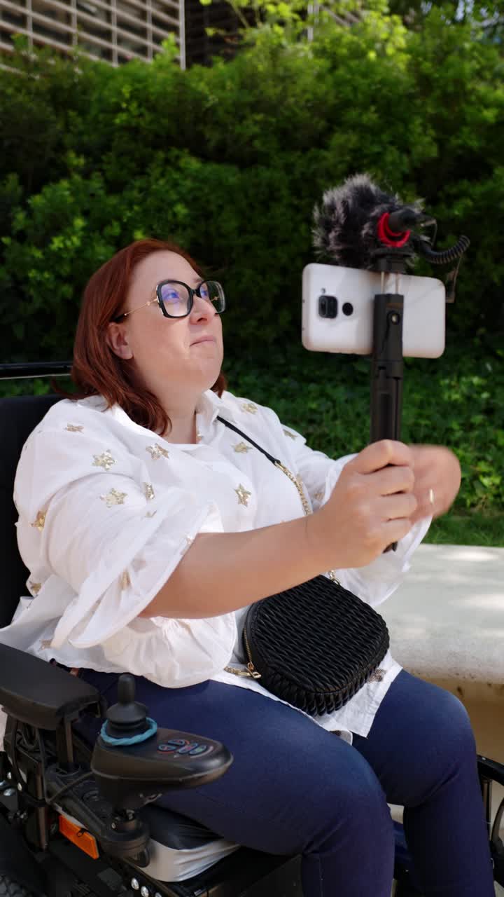 Woman in Wheelchair Vlogging Outdoors
