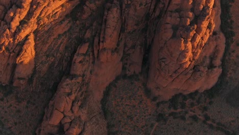 Top-down-aerial-shot-of-Snow-Canyon's-mountains-at-sunrise