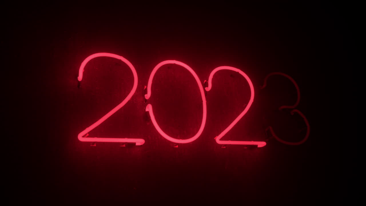 animación de números de luz brillante de neón 2023 sobre fondo negro