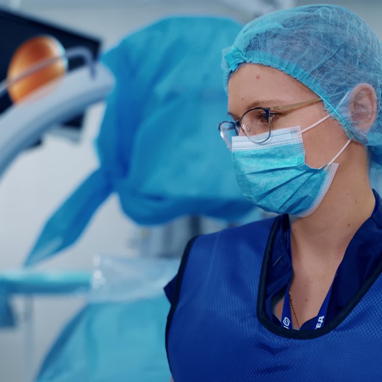 Artificial lung ventilation monitor in the intensive care unit. Nurse with medical equipment. Ventilation of the lungs with oxygen. COVID-19 and coronavirus identification. Pandemic.