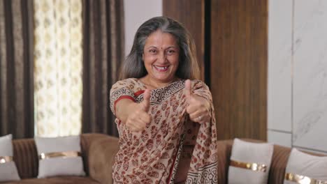 Happy-Indian-old-lady-showing-thumbs-up