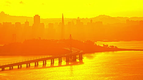 Timelapse,-Golden-Hour-Sunlight-Above-San-Francisco-Waterfront-and-Oakland-Bridge,-California-USA