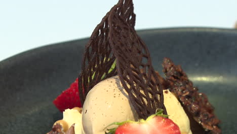 chocolate ice cream dessert with strawberries