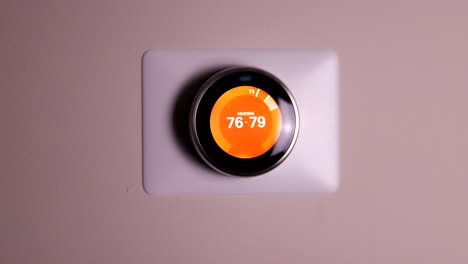 Smart-thermostat-being-adjusted-remotely