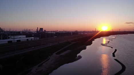 brielse meer and maasvlakte port in netherlands at sundown