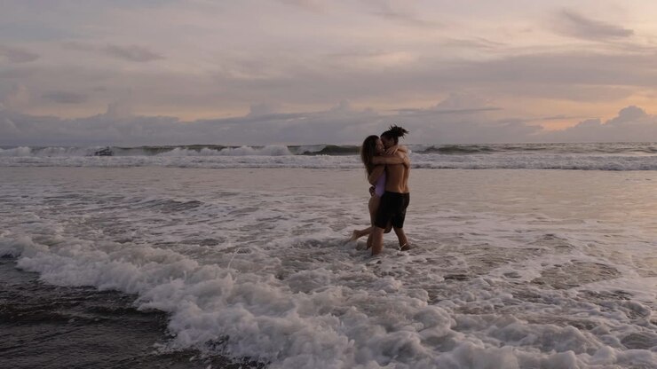 Couple playing with water