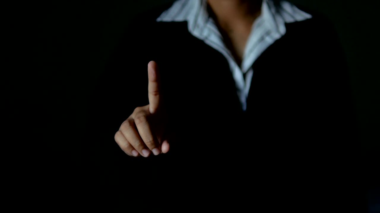 Business woman make hand gesture for technology concept dark and grain processed