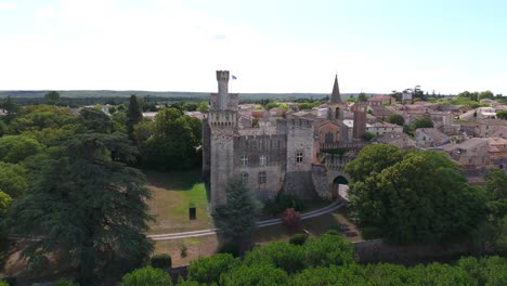 slow orbiting shot revealing the historic chateau de pouzilhac in the city