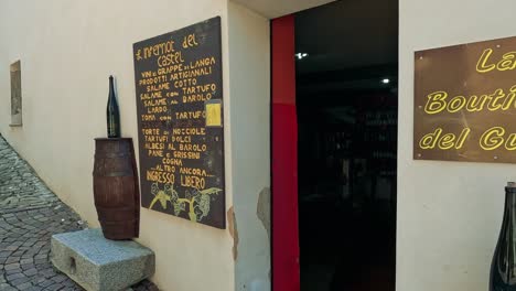 entrance of a wine shop in monforte d'alba