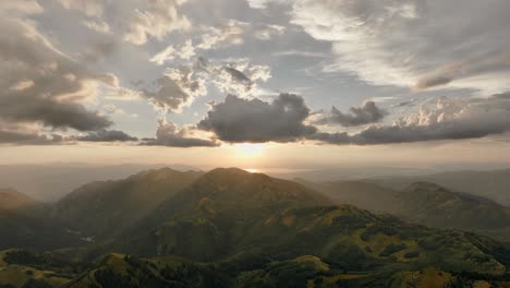 aerial of backcountry mountain range at sunset with beautiful cloud formation after a storm-3