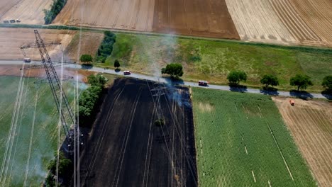 aerial view of burning wheat field - drone shot