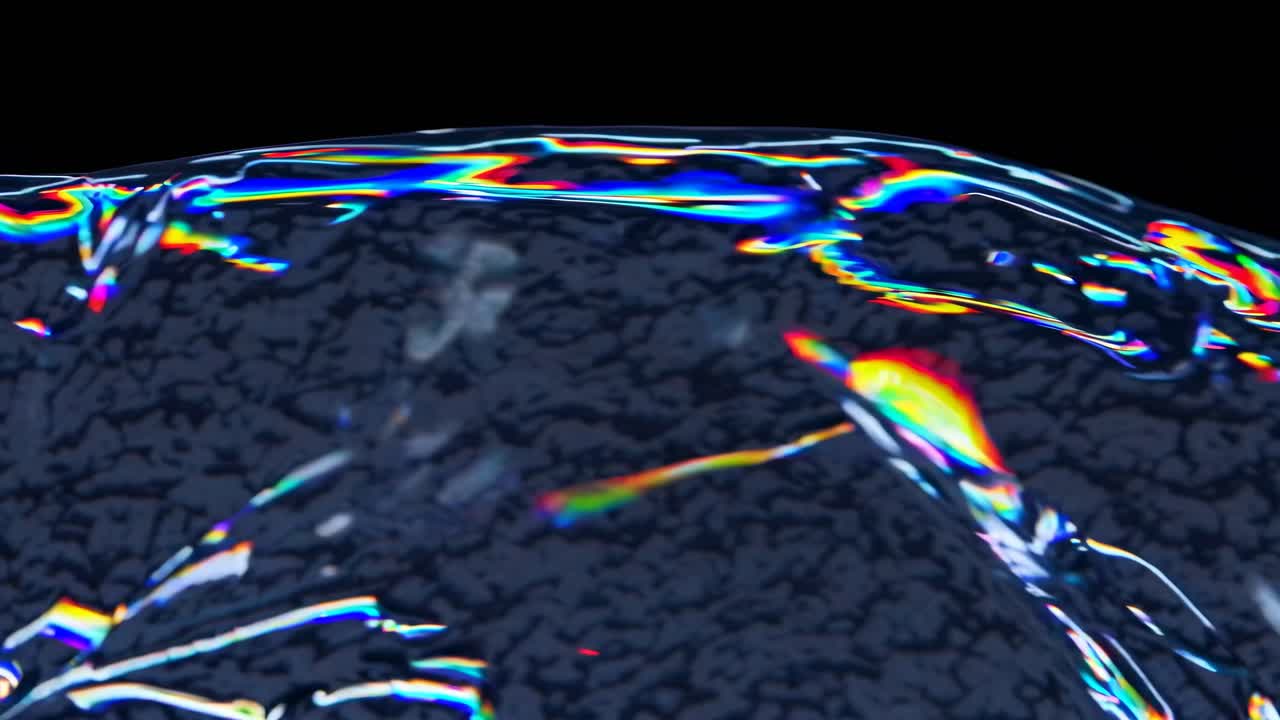 Video astratto di onde iridescenti con un angolo ravvicinato, che mostra motivi fluidi e vivaci