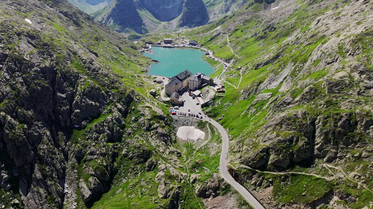 Grand Saint Bernard Pass, stunning alpine lake on Swiss-Italian border, drone