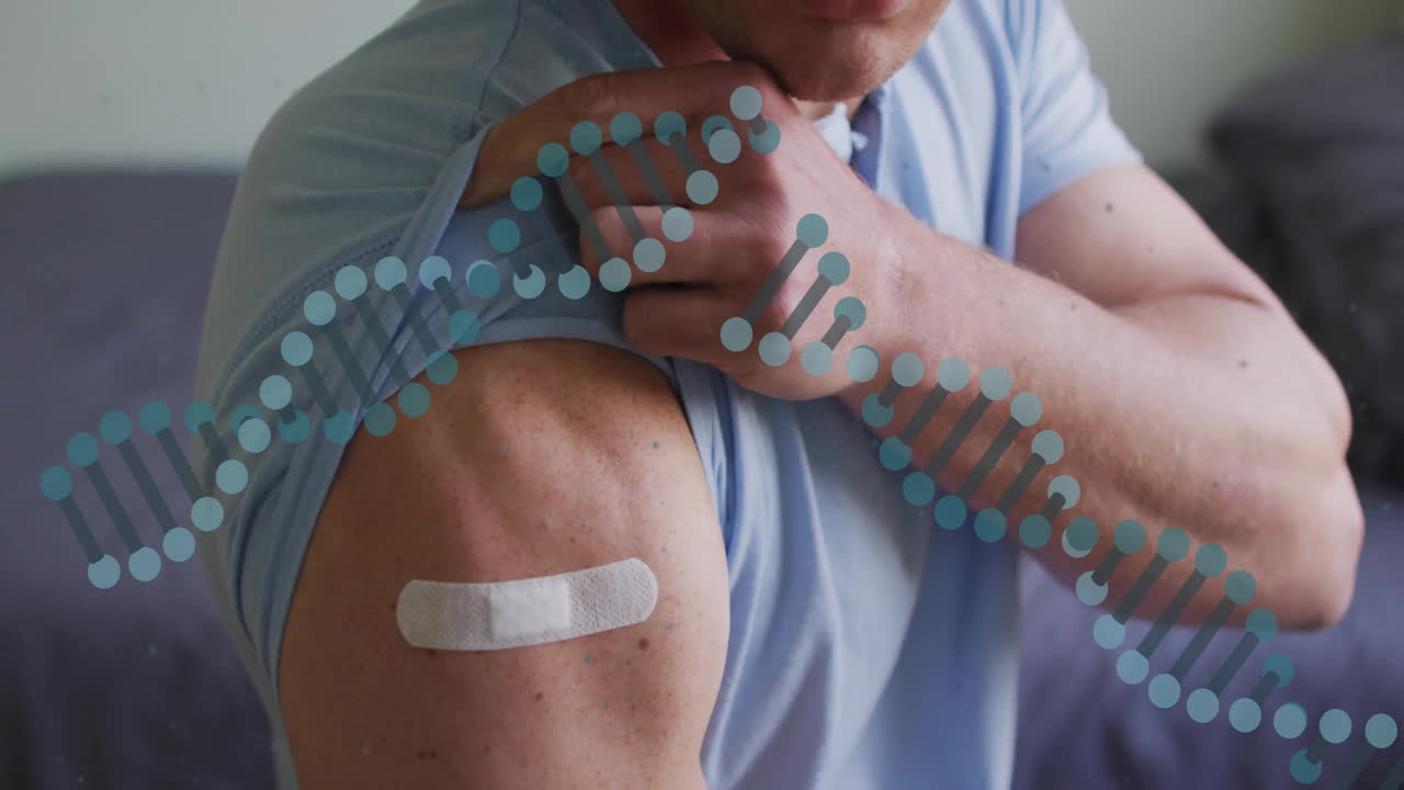 DNA strand animation over person showing arm with bandage