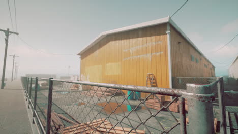 abandoned warehouse in a foggy rural area