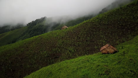 Logistic-concept-aerial-view-of-countryside-road-passing-through-the-serene-lush-greenery-and-foliage-tropical-rain-forest-mountain-landscape