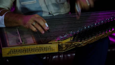 ottoman musical instrument "qanun". musical instrument known as "zither" in different cultures around the world