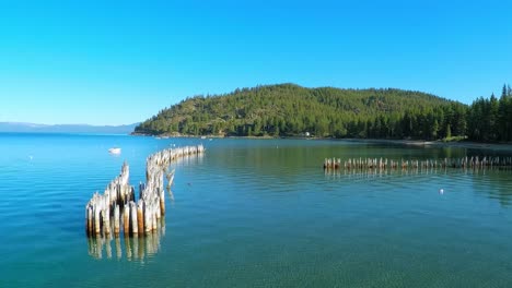 An-aerial-shot-over-old-pier-pilings-in-Glenbrook-Lake-Tahoe-Nevada