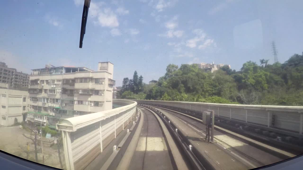 Elevated Train Journey Through City