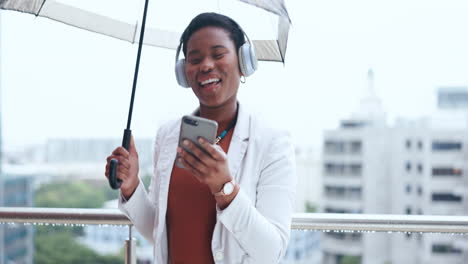 Umbrella,-headphones-and-business-woman-in-city