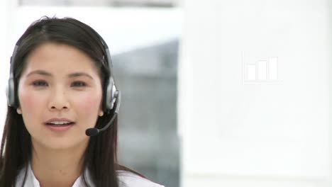 Animation-of-statistics-recording-over-businesswoman-using-phone-headsets