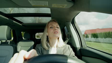 woman singing in a car