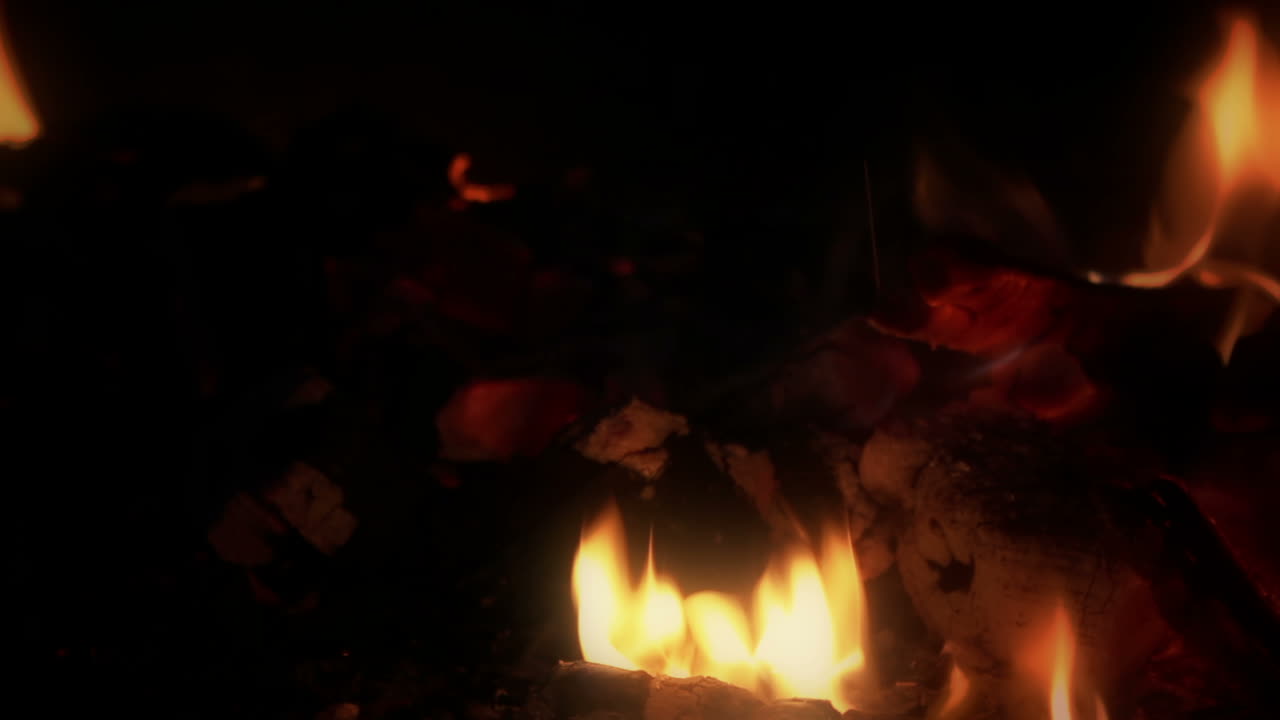 Close Up of Flames and Glowing Embers in a Fire