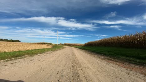 point of view footage while driving down a gravel road in rural iowa