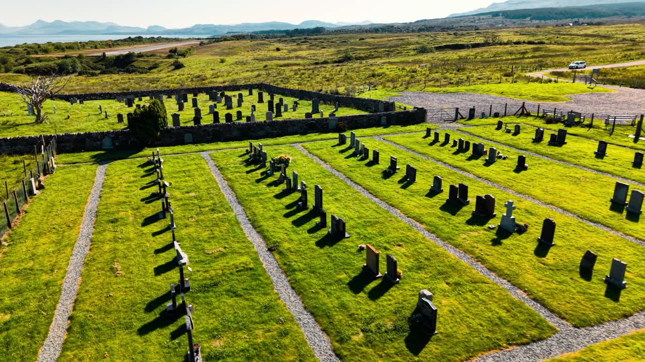 Aerial view of a cemetery in a grassy landscape