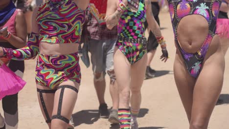 a lower view of people walking in the festival