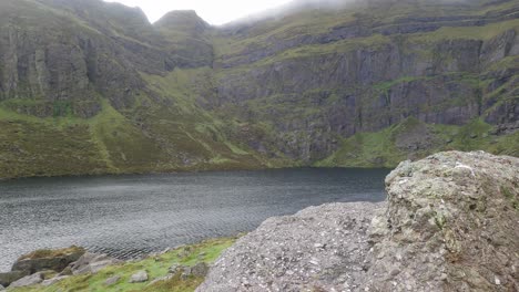 comeragh mountains waterford winter at the cold waters of coumshingaun lake on a cold winter day