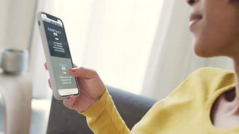 trendy woman browsing a website on her phone