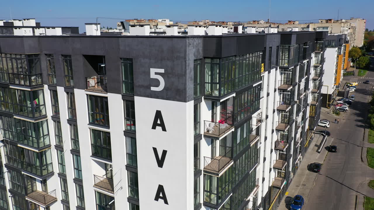 Drone view of city residential area. Aerial view of new modern apartment buildings for families