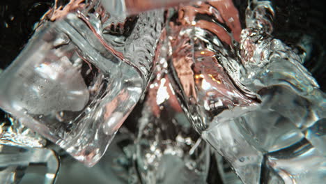 ice cubes splashing in water