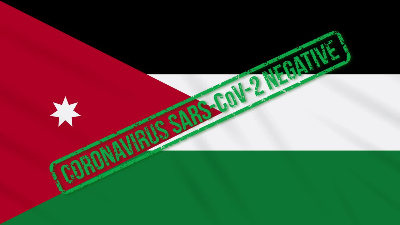 요르단이 코로나 바이러스로부터의 자유의 녹색 스프를 가진 발을 흔들고 있습니다.