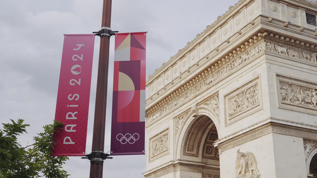 Paris 2024 Olympic banners near the Arc de Triomphe