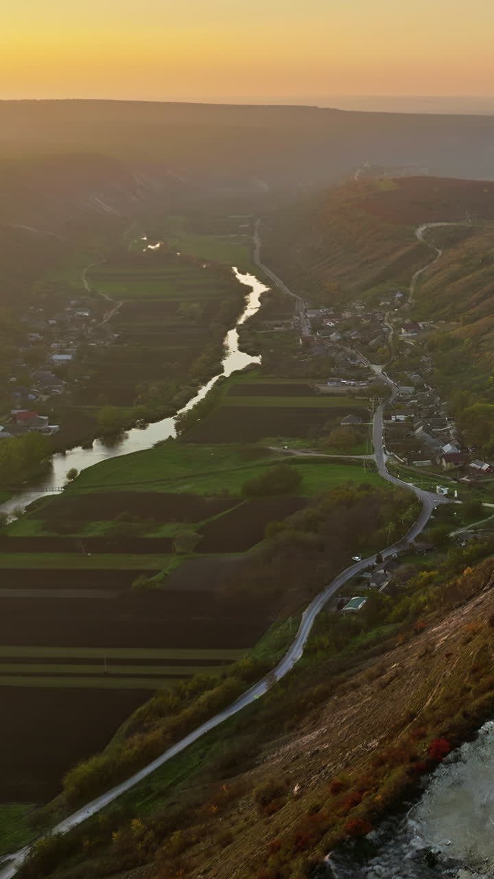 Aerial drone view of the Old Orhei historical and archaeological complex in Moldova at sunset. Vertical