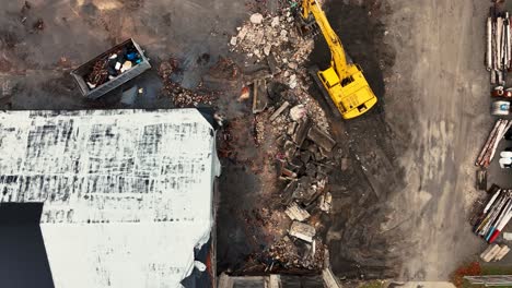 direct aerial view of the rubble before tilting away