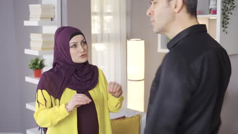 Family-problems.-Muslim-husband-and-wife-are-arguing-at-home.