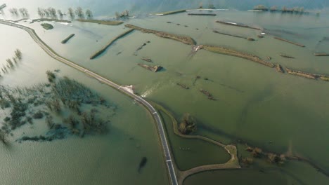 flooded road and surrounding landscape