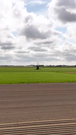 dutch landscape with windmill