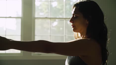 a moment of reflection: capturing serenity and stillness in the light of a sunlit room with a focused contemplative portrait