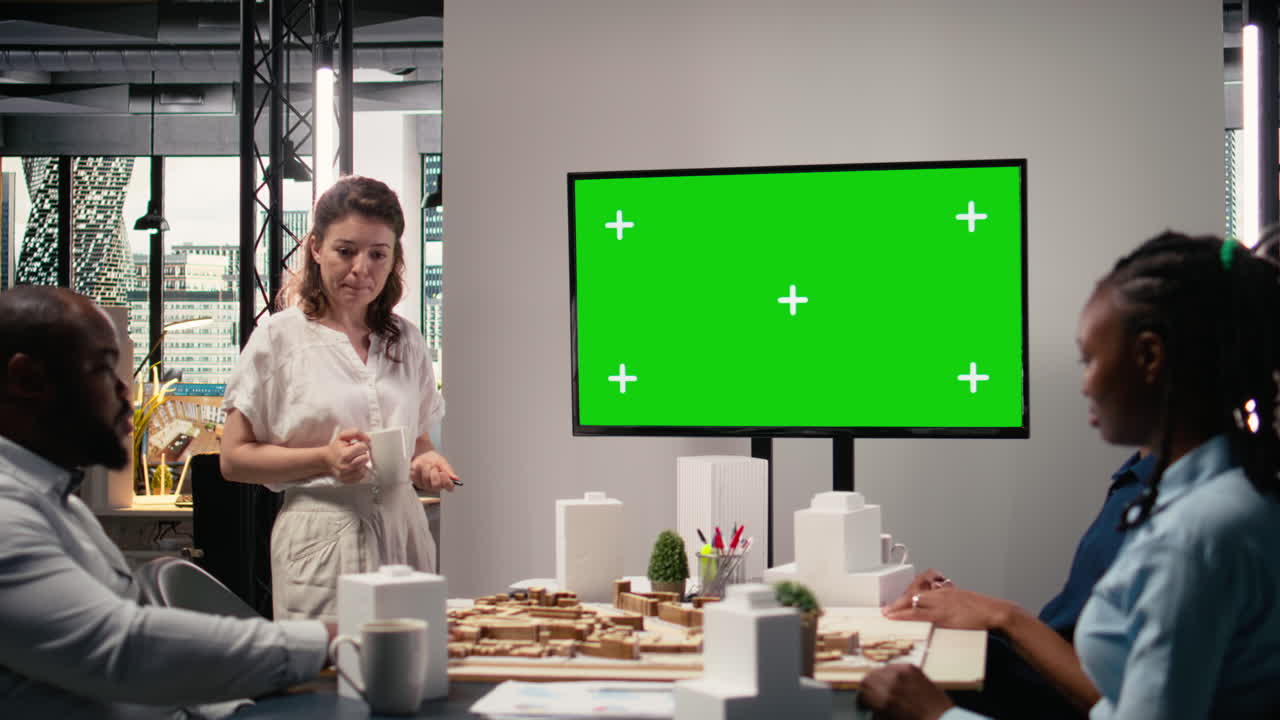 Diverse team exploring zoning regulations next to isolated display