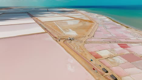 aerial drone shot of a salt flat going to the ocean, colombia, la guajira